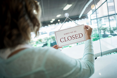 Closed business sign