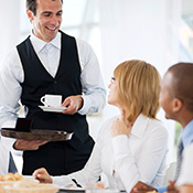 waiter with diners